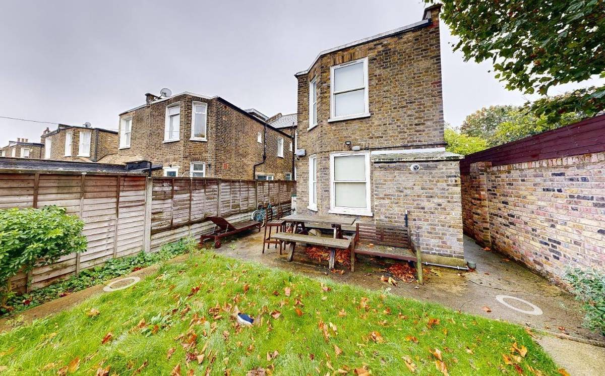 The existing rear of the terrace and garden before works (Design and Access Statement)