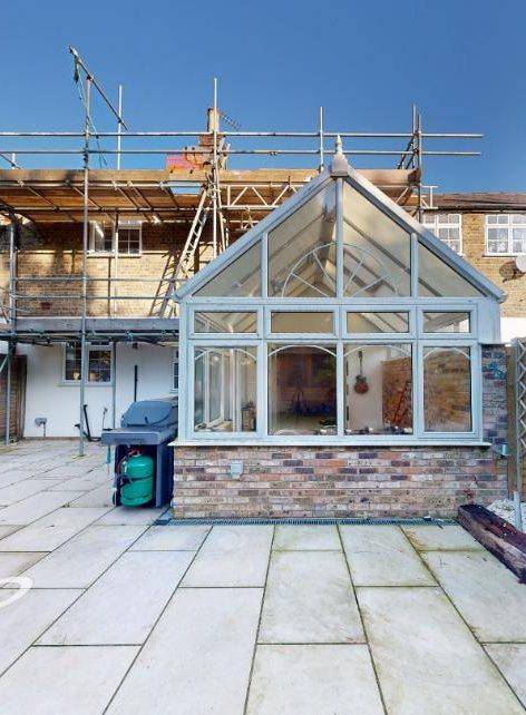 The existing glazed conservatory at the rear of the house (design and access statement)