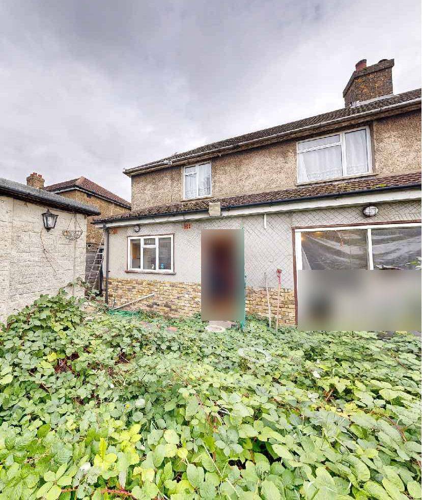 Rear of the house before works, with the existing single-storey extension (site photographs)