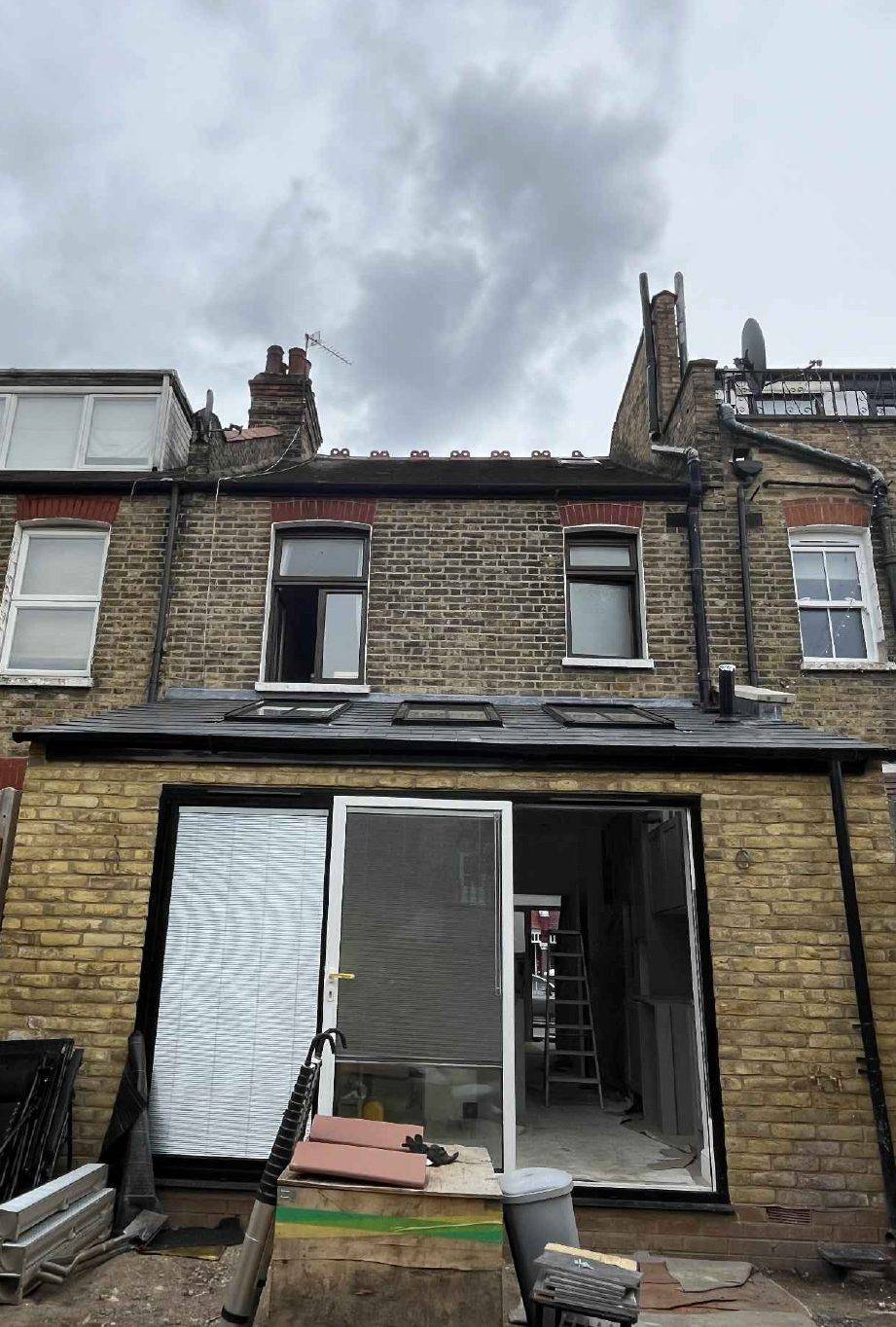 Rear of the house with the single-storey rear extension built, before the roof extension (Site photographs, 2024)
